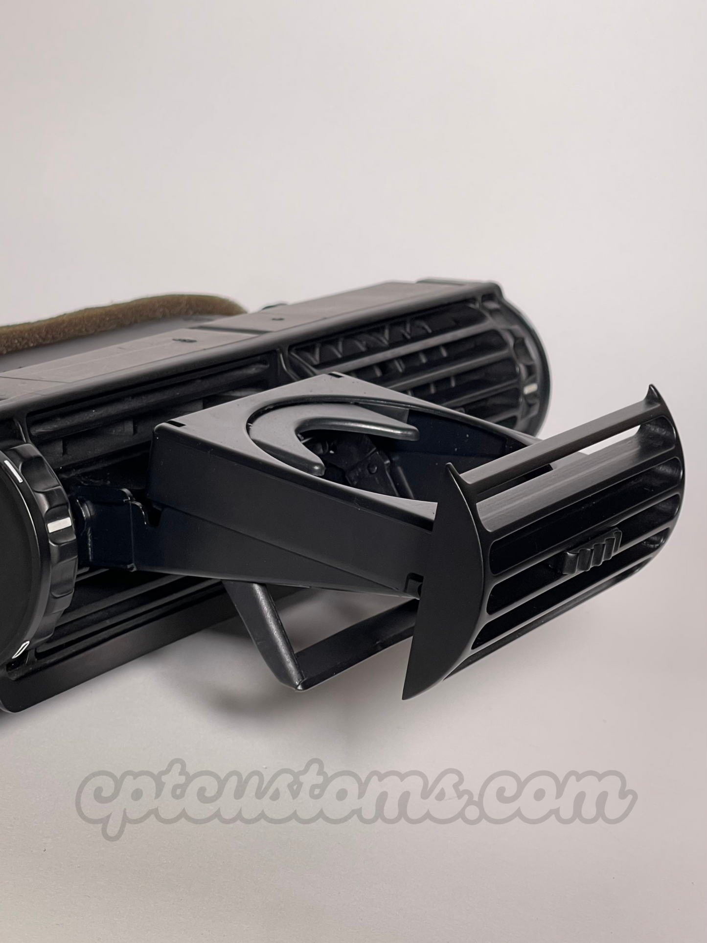BMW E30 Air Vent Cupholder – Opened, Side View Showing Grille from the Right