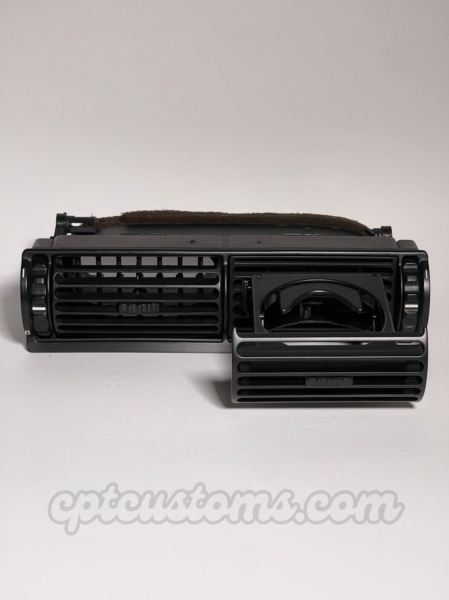 BMW E30 Air Vent Cupholder – Fully Closed, Installed on Left Side of Center Grille